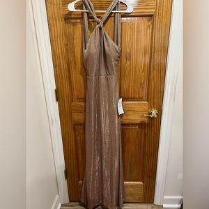 Beautiful floor length party/ formal gown. Size 5. Brand new with tags.